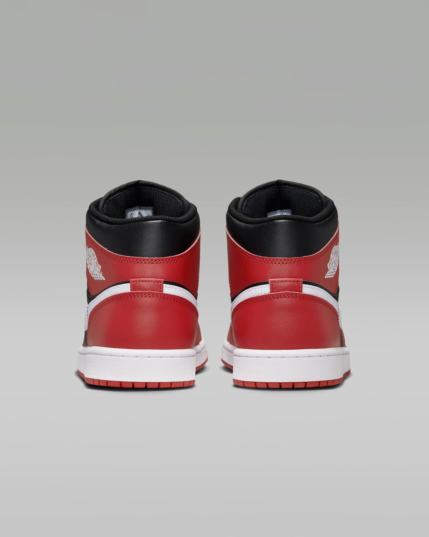 Tênis importado Nike Air Jordan 1 Mid vermelho e preto