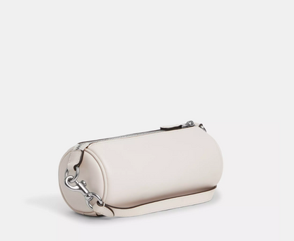 Bolsa COACH Nolita Barrel em Jacquard signature