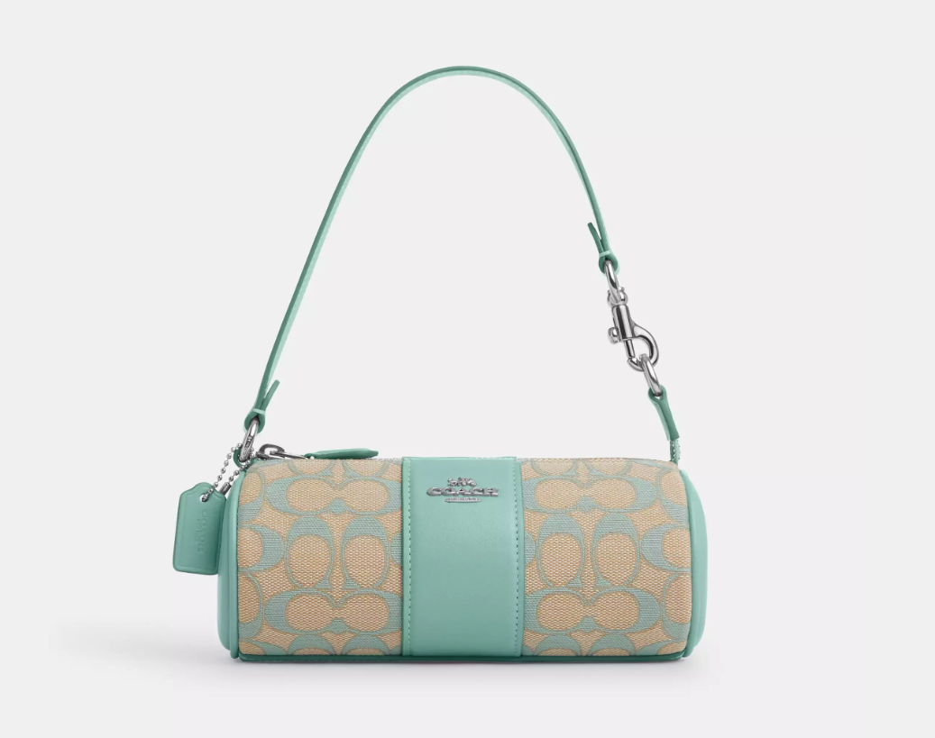 Bolsa COACH Nolita Barrel em Jacquard signature