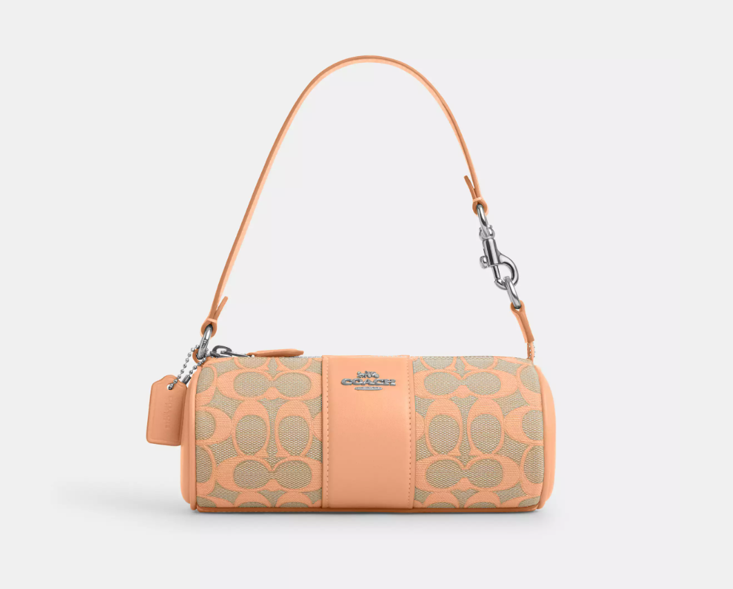 Bolsa COACH Nolita Barrel em Jacquard signature