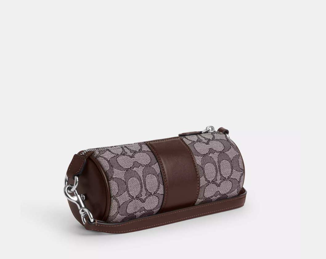 Bolsa COACH Nolita Barrel em Jacquard signature