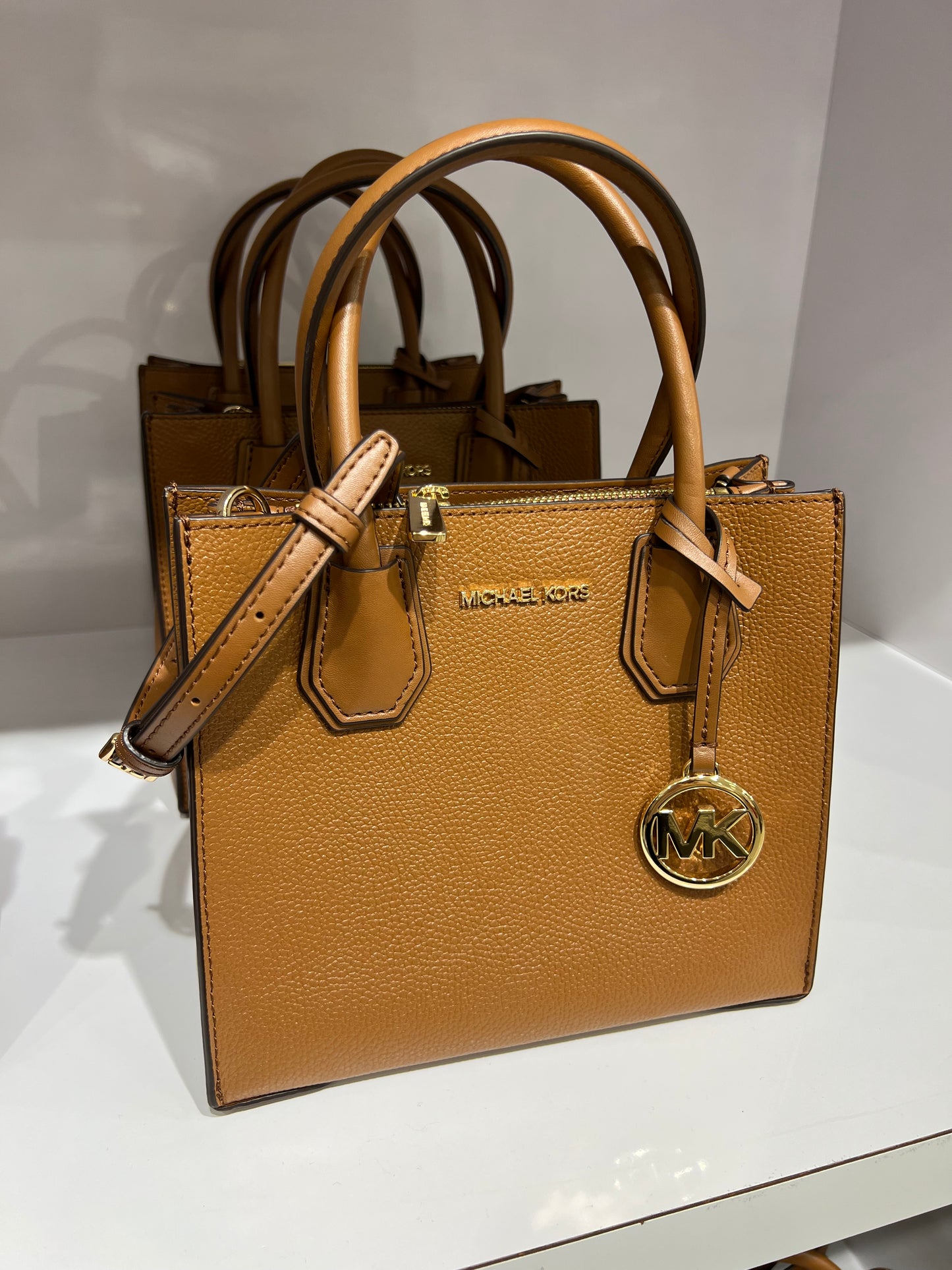 Bolsa importada MICHAEL KORS estruturada Mercer de mão e transversal